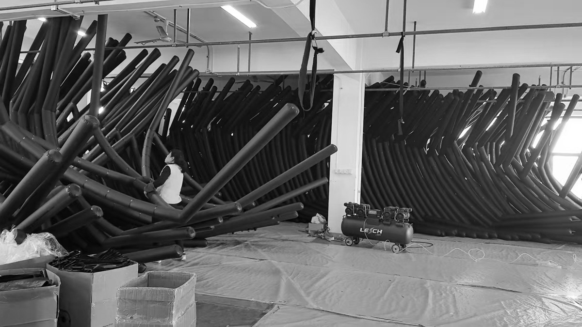 In-process quality control (IPQC) of inflatable tent beams using pressure testing equipment.