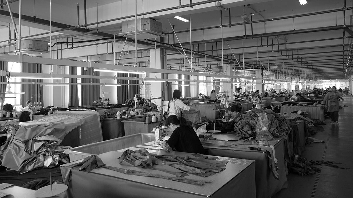 Standardized sewing workshop of nastocamp factory ensuring consistency in mass production of tents.