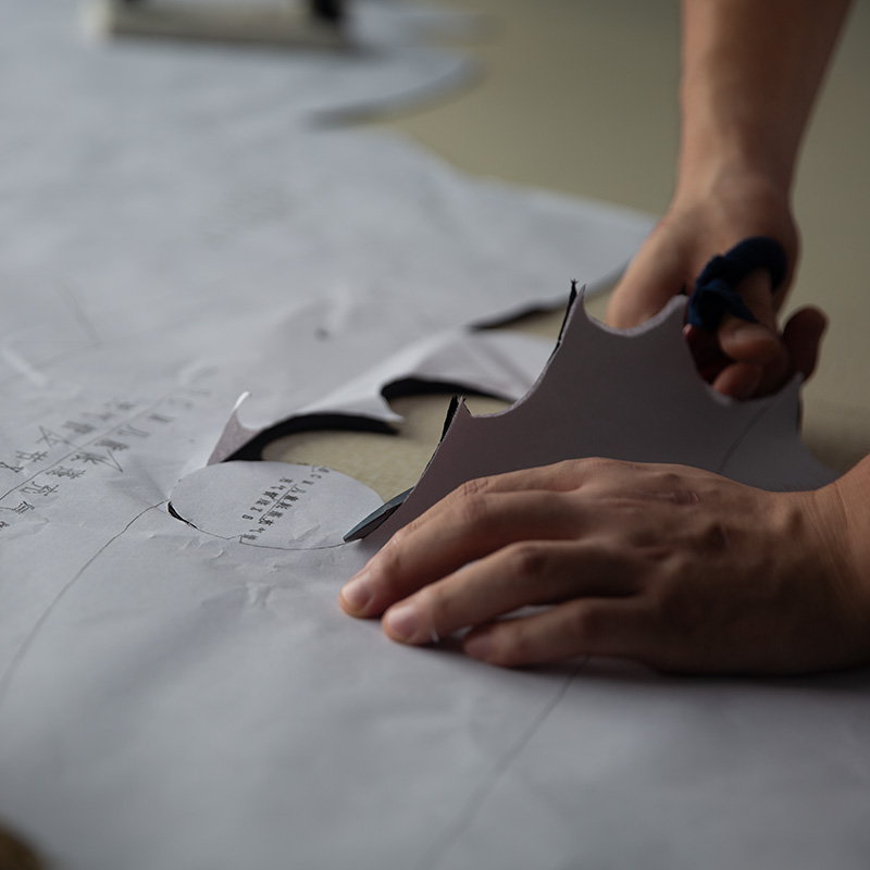 Custom OEM tent structural engineering blueprints and fabric sample development.