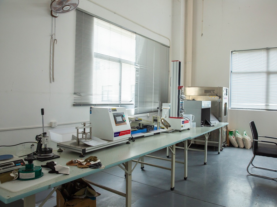 Quality testing laboratory with material inspection equipment at NastoCamp