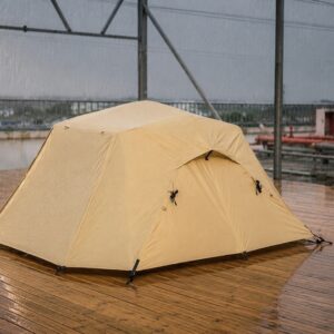 Camping tent undergoing rain testing at NastoCamp manufacturing facility