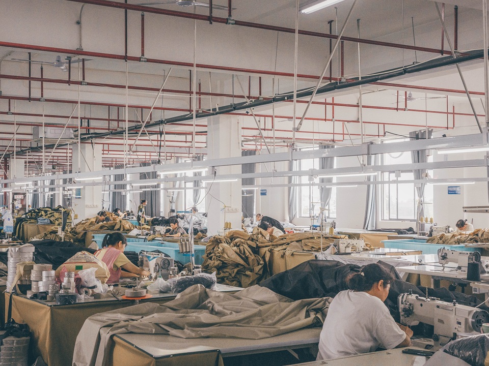 Workers manufacturing camping tents in NastoCamp's production workshop