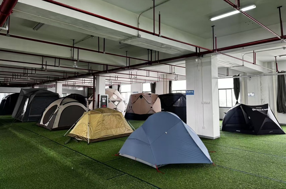 Multiple custom tent designs displayed at NastoCamp OEM tent factory showroom
