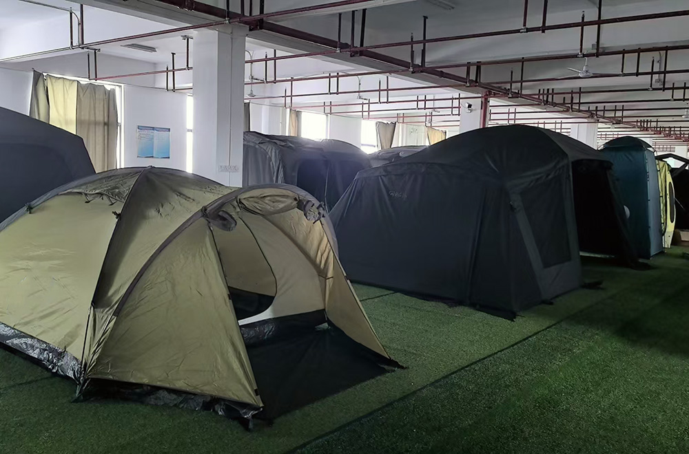 Tent samples displayed inside NastoCamp manufacturing facility showing OEM tent development capability