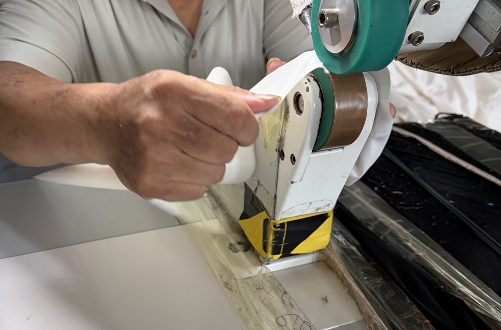 Tent seam tape bonding process during waterproof quality control