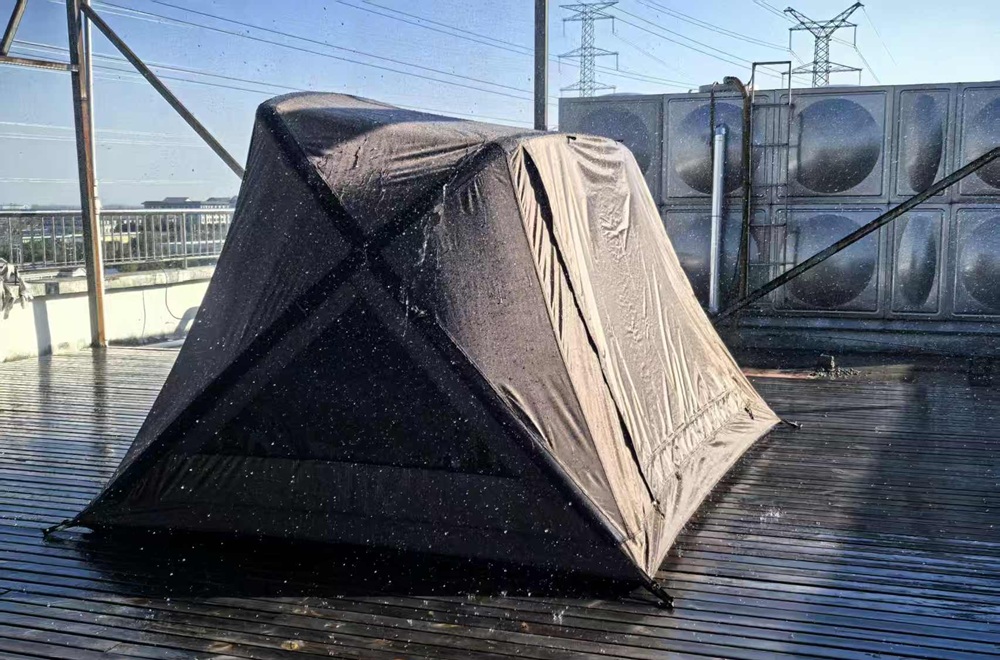 Tent waterproof testing to verify seam sealing performance and construction quality