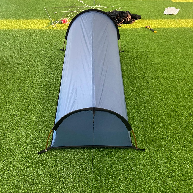 Ultralight backpacking tent setup demonstration for solo hiking
