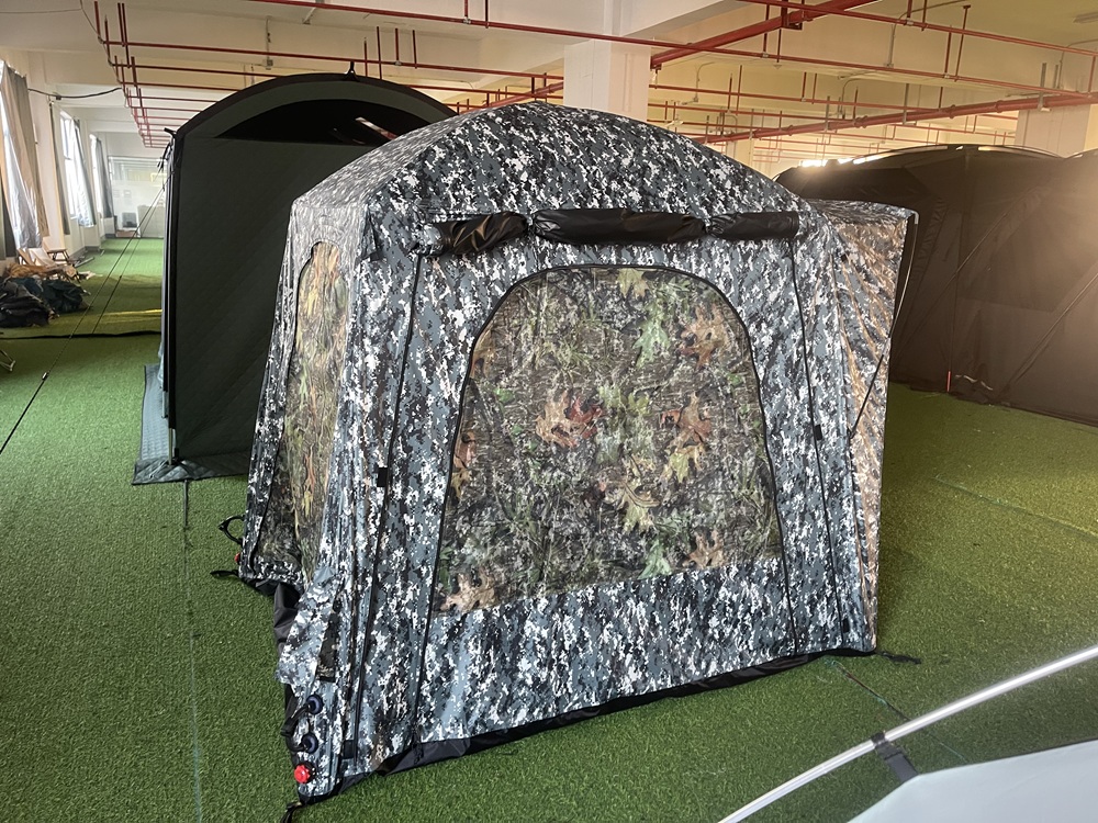 NC-SU-0027 camouflage inflatable fishing tent displayed at NastoCamp factory