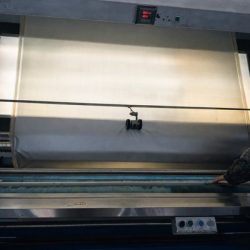 Fabric inspection machine used for incoming material quality control in OEM tent manufacturing